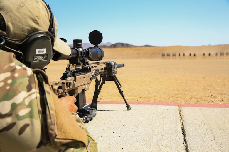 A sheriff from Williamson County, Texas, sights in down range during a sniper training course hosted by the Marksmanship Training Unit  aboard the Marine Corps Air Ground Combat Center, Twentynine Palms, Calif., April 25, 2018. The sniper course was held from April 24 to April 27, 2018 to advance participants’ skills in marksmanship techniques for combat scenarios. (U.S. Marine Corps photo by Lance Cpl. Isaac Cantrell)