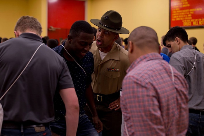 Gunnery Sgt. Isaac C. Anderson, drill instructor, Receiving Company, Support Battalion, corrects a recruit during receiving at Marine Corps Recruit Depot San Diego, April 30. Anderson informed the recruit to respond properly by answering loudly every time a drill instructor gave him orders. Recruits are required to follow all instructions from drill instructors throughout recruit training. Annually, more than 17,000 males recruited from the Western Recruiting Region are trained at MCRD San Diego. Charlie Company is scheduled to graduate July 27.
Photos by: Lance Cpl. Jose Gonzalez