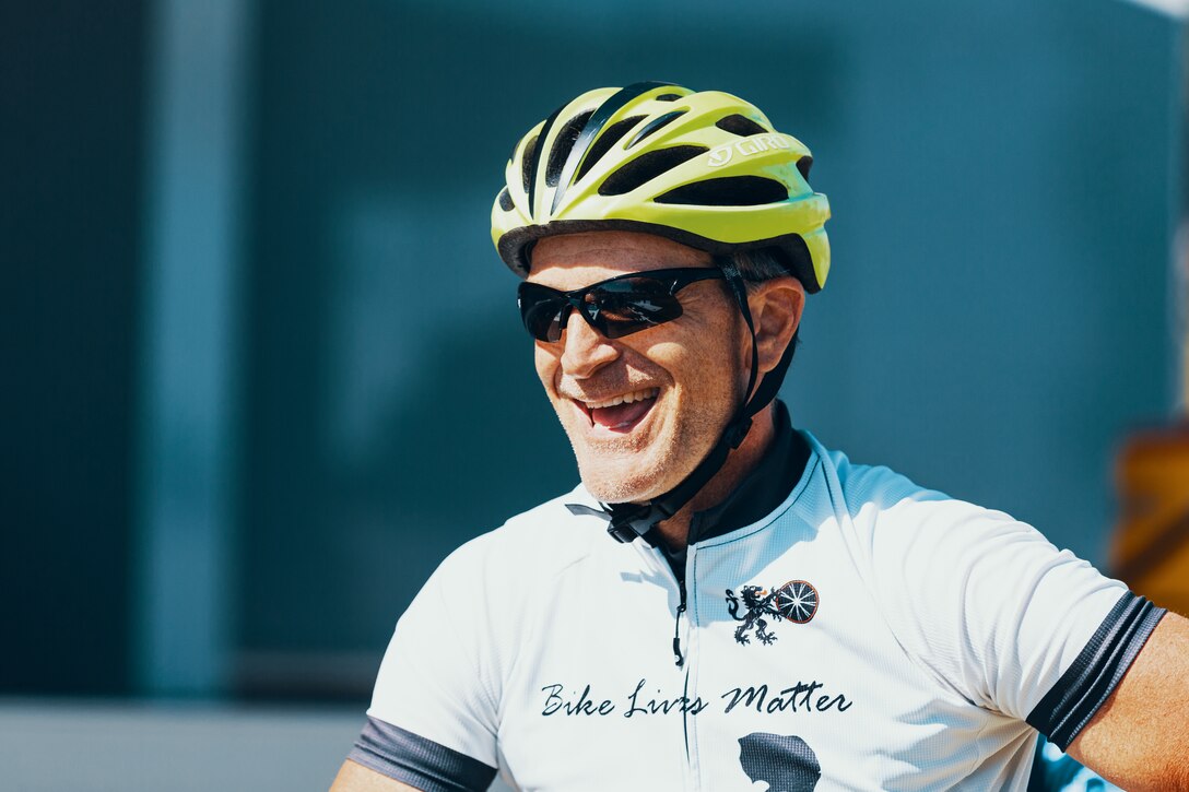 A participant of the 4th Annual Park-2-Park Bike Ride finishes the full course event that measured 52-miles through Twentynine Palms, Calif., and Joshua Tree National Park, Calif., April 28, 2018. The purpose of Park-2-Park is to bring families and friends of Twentynine Palms together in celebration of Earth Day. (U.S. Marine Corps photo by Lance Cpl. Rachel K. Porter)