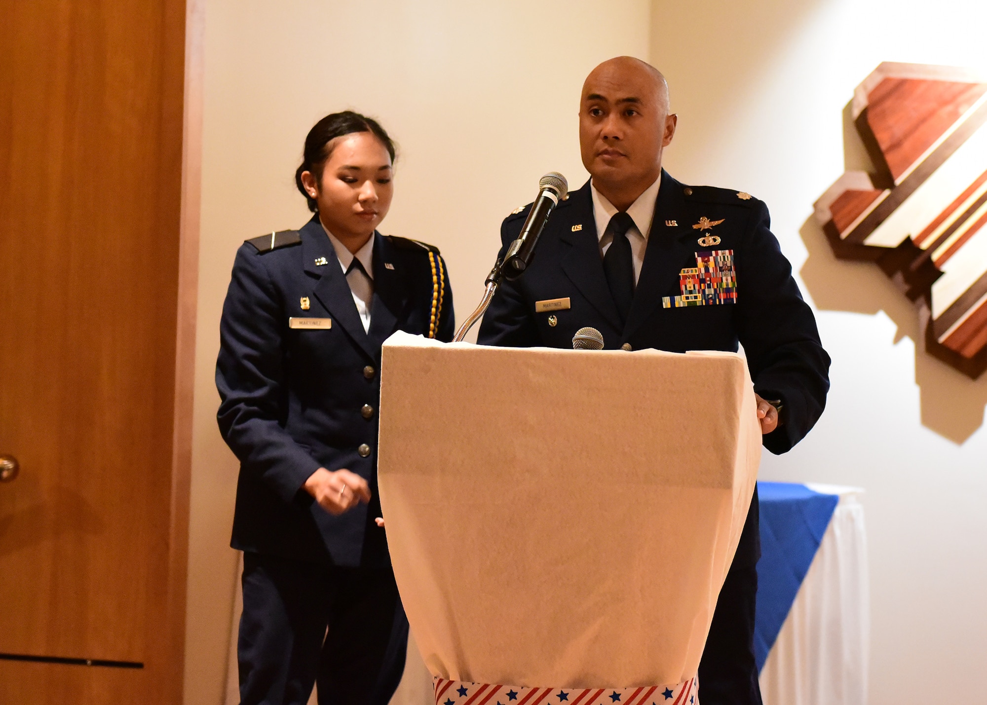 Guest speakers prepare to deliver speech.
