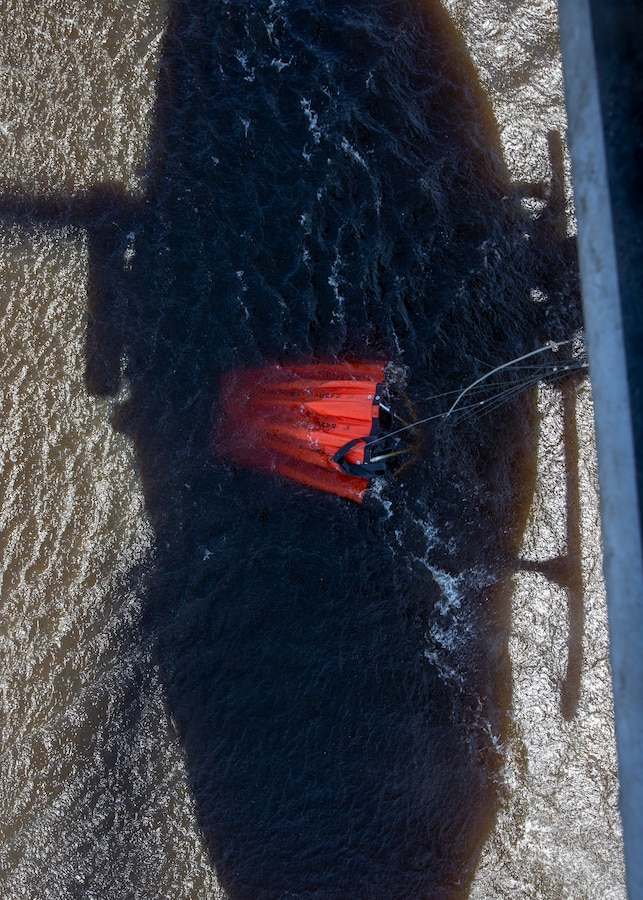 A UH-1Y Venom with Marine Light Attack Helicopter Squadron (HMLA) 267, Marine Aircraft Group 39, 3rd Marine Aircraft Wing, collects water with a firefighting bucket during the Corey Iverson Wildland Firefighting Exercise at Marine Corps Base Camp Pendleton, Calif., May 3. The exercise is an annual training event designed to increase emergency preparedness and cohesion between civilian and military firefighting agencies during California’s wildfire season. (U.S. Marine Corps photo by Lance Cpl. Clare J. McIntire/Released)