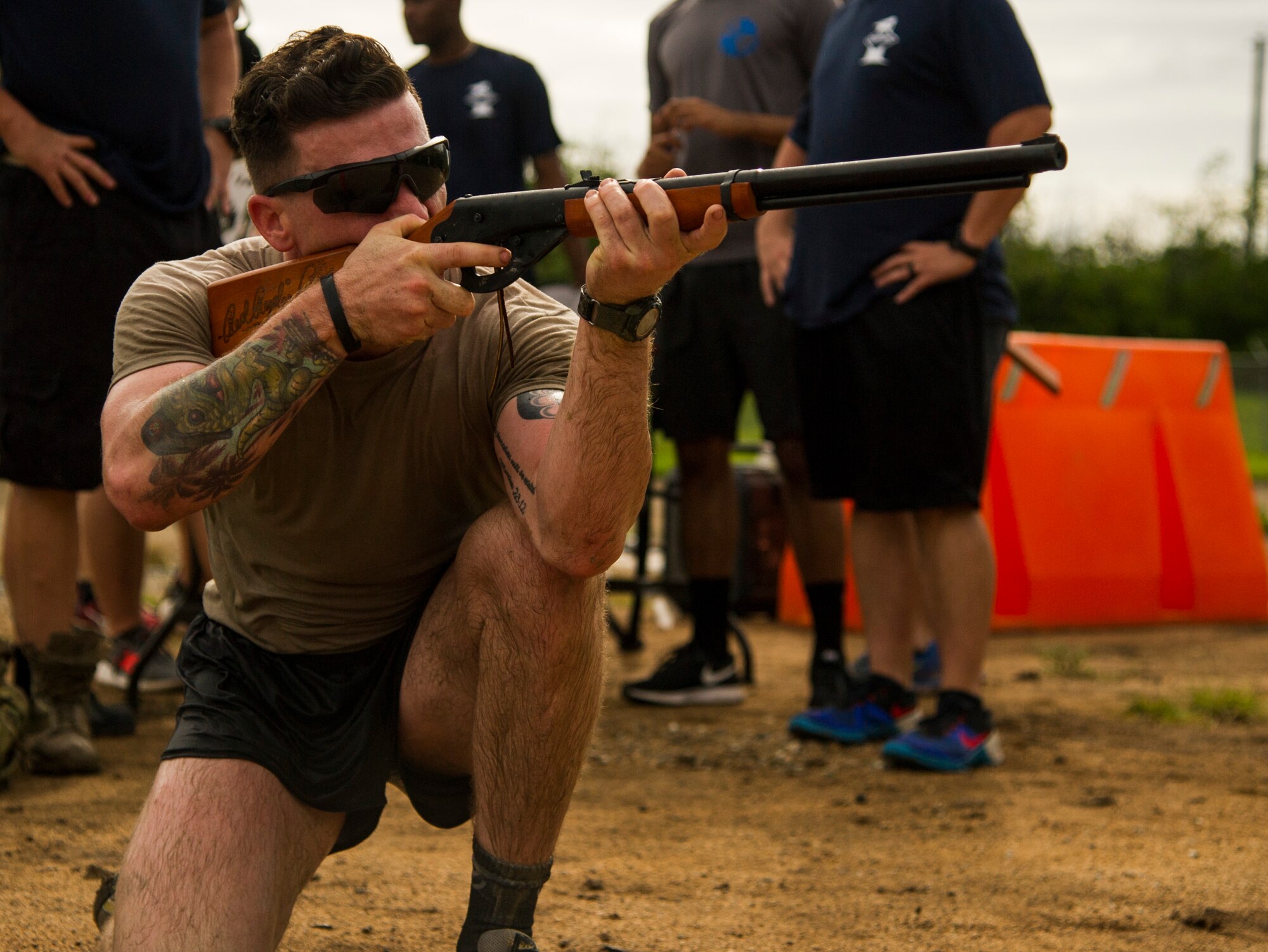 Participants compete against one another during the Inaugural Diamond Mudder, Joint Base Pearl Harbor-Hickam, Hawaii, May 4, 2018.  The Diamond Mudder was a seven-mile team race, consisting of eight obstacles ranging from buddy drags to marksmanship. (U.S. Air Force photo by Tech. Sgt. Heather Redman)
