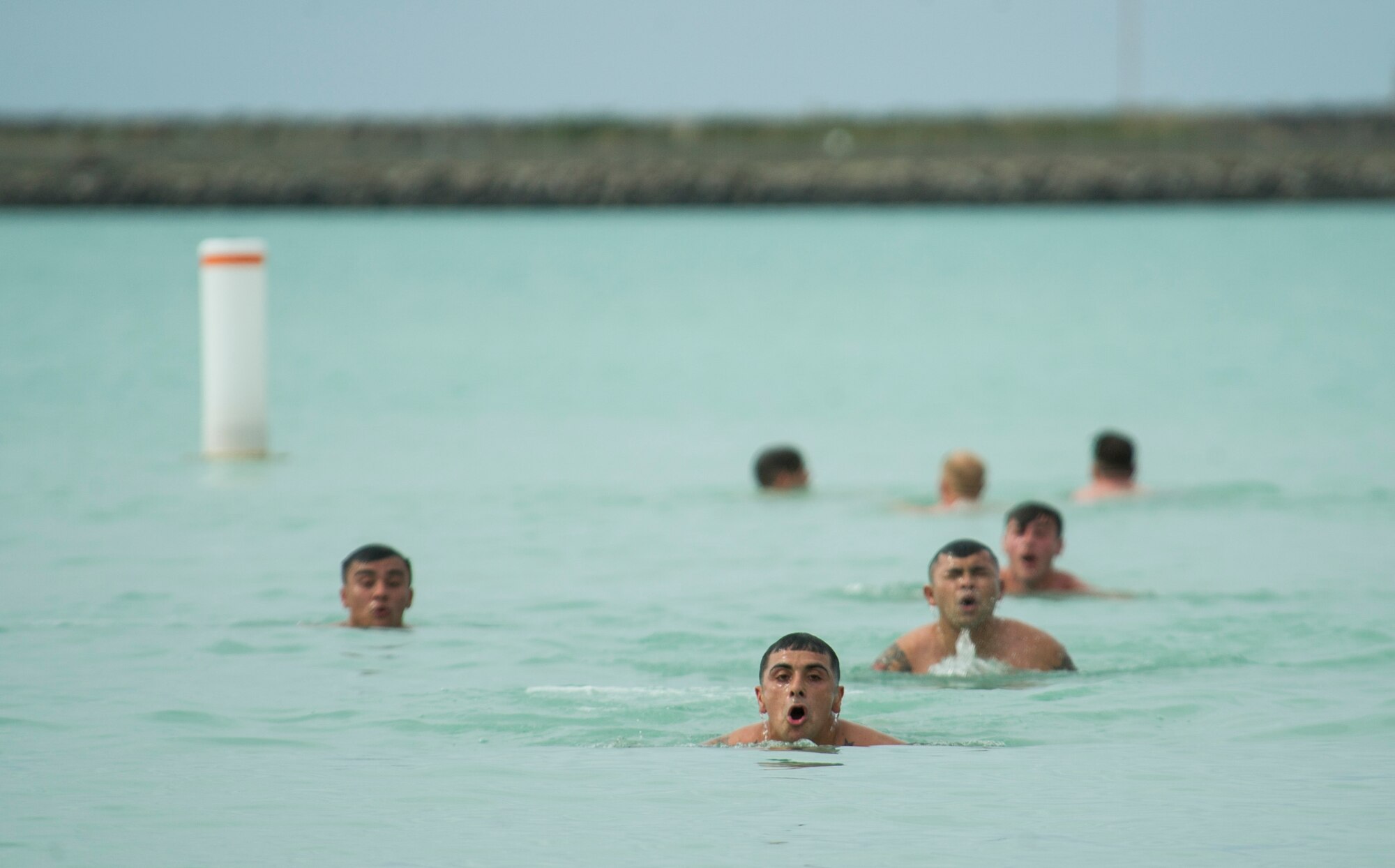 Participants compete against one another during the Inaugural Diamond Mudder, Joint Base Pearl Harbor-Hickam, Hawaii, May 4, 2018.  The Diamond Mudder was a seven-mile team race, consisting of eight obstacles ranging from buddy drags to marksmanship. (U.S. Air Force photo by Tech. Sgt. Heather Redman)