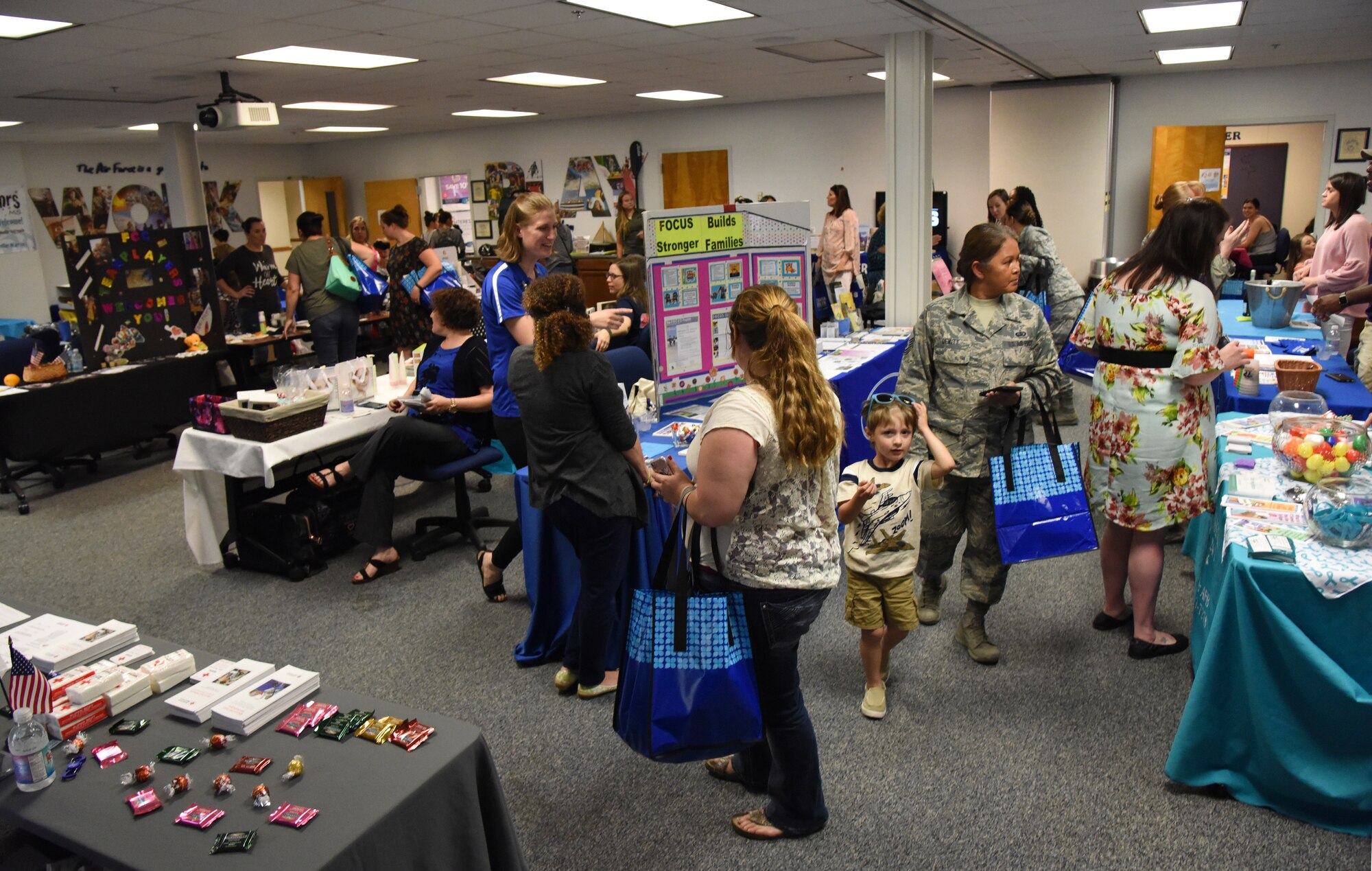 Military spouses attend Pamper Me Day in the Sablich Center at Keesler Air Force Base, Mississippi, May 3, 2018. The 81st Force Support Squadron Airman & Family Readiness Center has hosted the event for the past 14 years, offering military spouses information and business booths, free manicures, makeup tips and giveaways. (U.S. Air Force photo by Kemberly Groue)