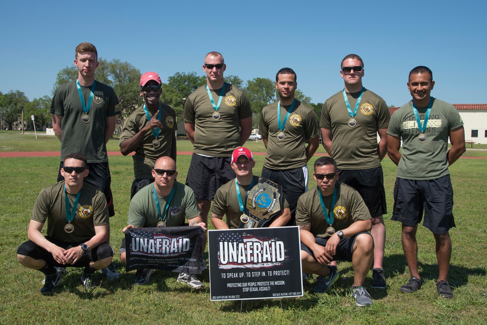 The 902nd Security Forces Squadron “Survivor’s Challenge” team pose for the photo after winning first place during the competition April 27, 2017, at Joint Base San Antonio-Randolph. Survivor’s Challenge is a JBSA competition where teams compete in mental and physical challenges to help raise awareness and prevent sexual assault within the military and federal service. (U.S. Air Force photo by Sean M. Worrell)