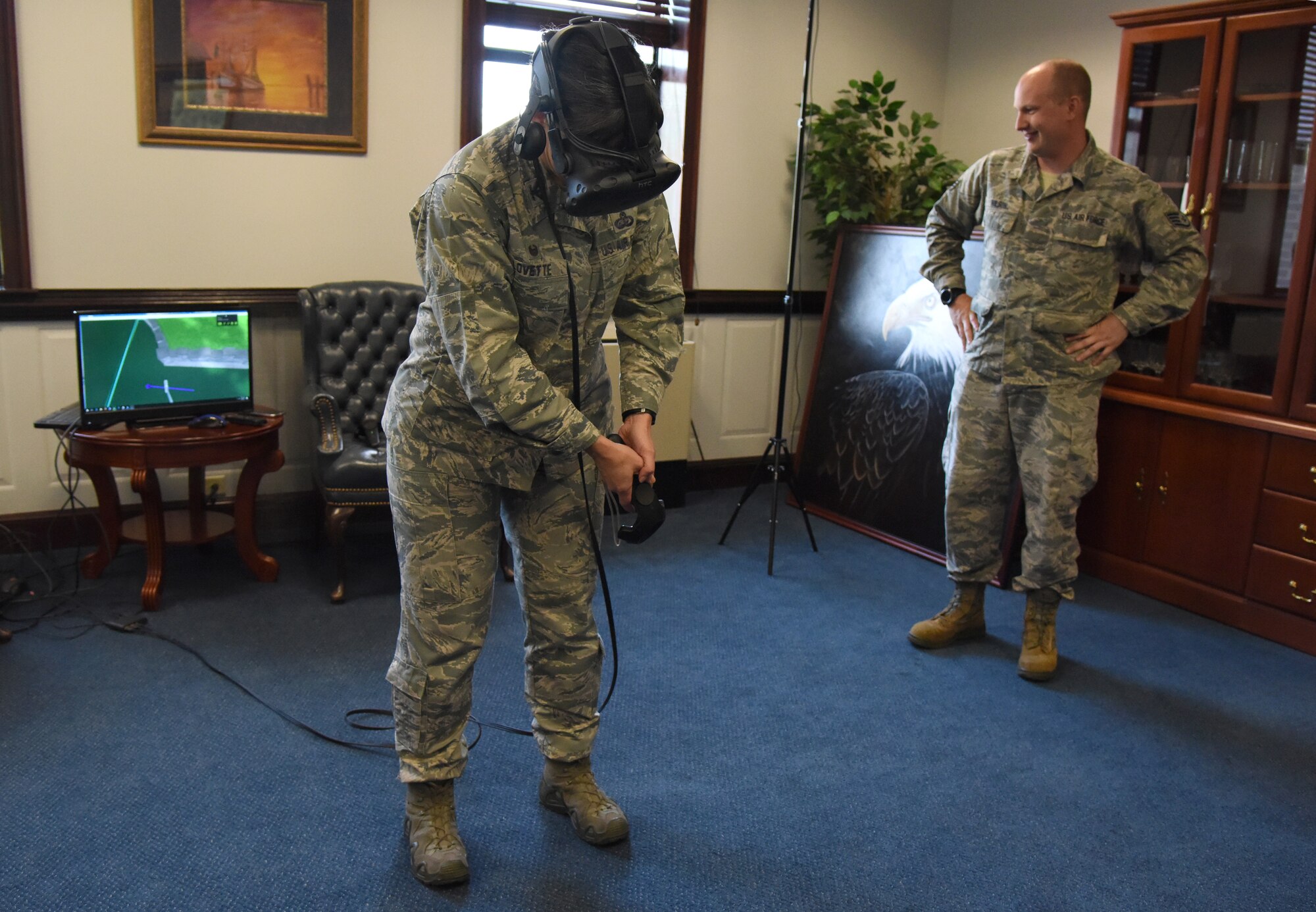 U.S. Air Force Col. Debra Lovette, 81st Training Wing commander, participates in a virtual reality demonstration in the 81st TRW headquarters building at Keesler Air Force Base, Mississippi, May 4, 2018. The 81st Training Group has implemented augmented and virtual reality into training, such as airfield, weather and air traffic control training. (U.S. Air Force photo by Kemberly Groue)