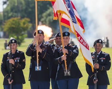 Military members render honors as the national anthem plays during the annual Military Appreciation Weekend May 6, 2017 at Joint Base San Antonio-Fort Sam Houston, Texas. U.S. U.S. Army North and JBSA hosted the two-day event, which featured music, family activities, and various military demonstrations. This year, the appreciation weekend also commemorated the 300th anniversary for the city of San Antonio. (U.S. Air Force photo by Ismael Ortega / Released)