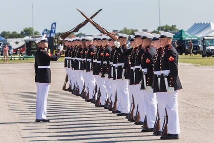 U.S. Marines with the  Silent Drill Platoon execute silent exhibition drill movements during the annual Military Appreciation Weekend May 6, 2017 at Joint Base San Antonio-Fort Sam Houston, Texas. U.S. U.S. Army North and JBSA hosted the two-day event, which featured music, family activities, and various military demonstrations. This year, the appreciation weekend also commemorated the 300th anniversary for the city of San Antonio. (U.S. Air Force photo by Ismael Ortega / Released)