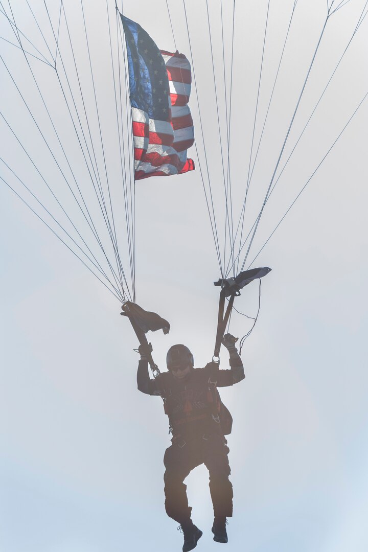 A U.S. Army Special Operations Command “Black Daggers” Parachute Team member descends during the annual Military Appreciation Weekend May 6, 2017 at Joint Base San Antonio-Fort Sam Houston, Texas. U.S. U.S. Army North and JBSA hosted the two-day event, which featured music, family activities, and various military demonstrations. This year, the appreciation weekend also commemorated the 300th anniversary for the city of San Antonio. (U.S. Air Force photo by Ismael Ortega / Released)