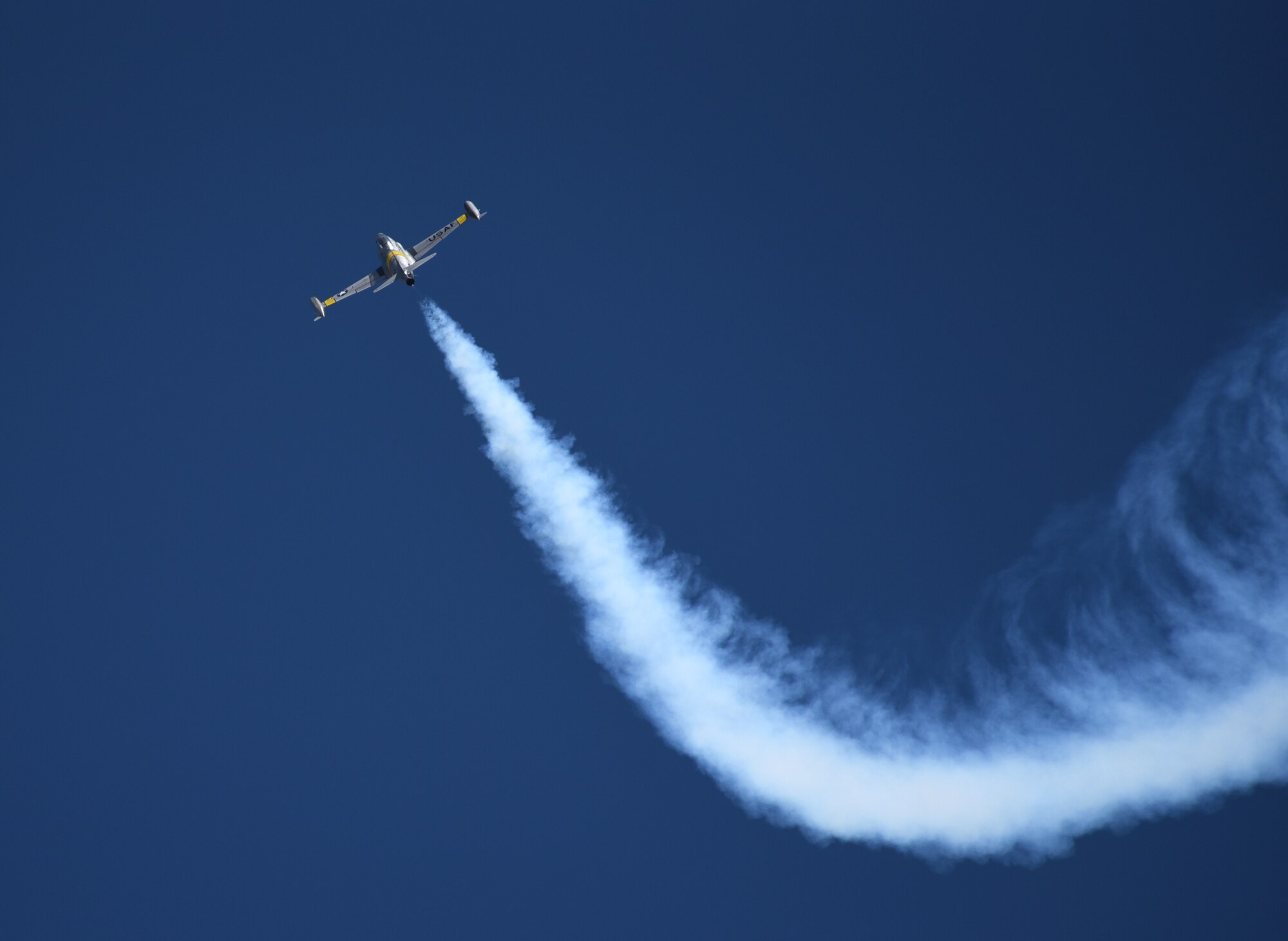 A T-33 Acemaker soars over Holloman Air Force Base during the 2018 Legacy of Liberty open house in N.M., May 5, 2018. Holloman opened its gates to the public to show some of the capabilities of the U.S. Air Force, including an F-16 Fighting Falcon demonstration team, several static displays and a show from the Air Force Academy's Wings of Blue Team. (U.S. Air Force photo by Staff Sgt. Timothy Young)