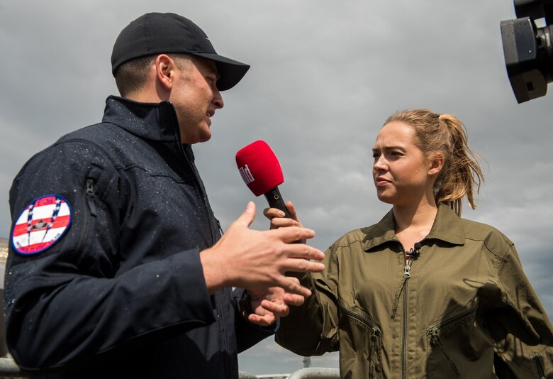 Capt. Andrew “Dojo” Olson, F-35 Heritage Flight Team commander and pilot, participates in an interview during the 2018 Berlin Air and Trade show at the Berlin Schönefeld Airport in Berlin, April 25, 2018. The show provides a collaborative opportunity to share and strengthen the U.S. and European strategic partnership that has been forged during the last seven decades and is built on a foundation of shared values, experiences and vision