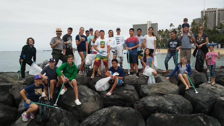 Honolulu District Commander Col. James T. Hoyman volunteered alongside 43 Punahou School Junior ROTC students, District employees and their friends and families to clean up the beach and berm area behind the Corps' Pacific Regional Visitor Center (RVC) at Fort DeRussy in Waikiki, April 28, 2018. Coordinating the volunteer Punahou JROTC cadets was Lt. Col. (Ret.) Robert Takao, commander of the Punahou School Junior ROTC Program. (courtesy photo)