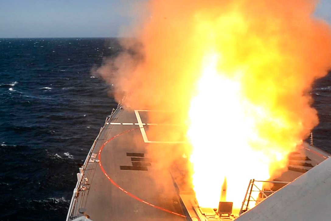 A missile launches from the guided-missile destroyer USS Spruance.