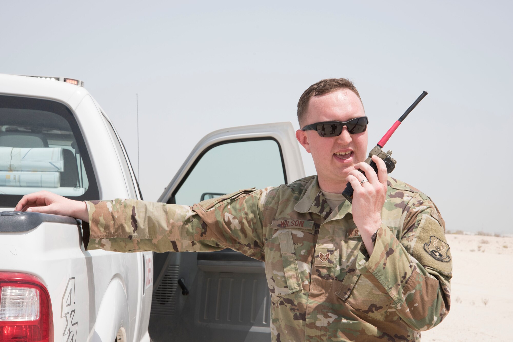 U.S. Air Force Tech, Sgt. Michael Molson from the 380th Expeditionary Medical Group simulates a dispatch call to the crisis action team during a joint agency exercise here, May 2. (U.S. Air National Guard photo by Staff Sgt. Erica Rodriguez)