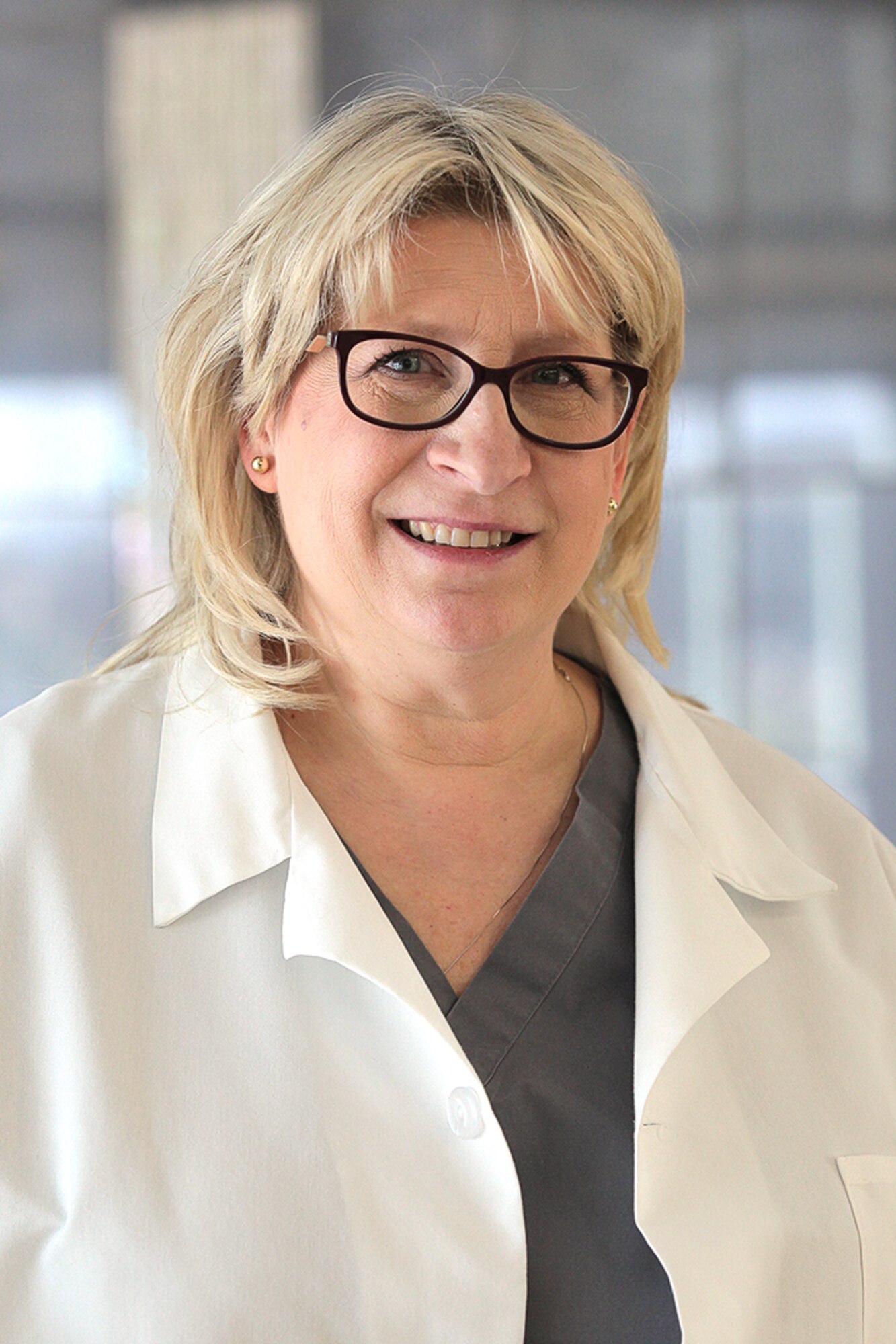 Retired U.S. Air Force Reserve Lt. Col. Ruthann Johns, a registered nurse at Malcom Grow Clinic, Joint Base Andrews, Md. (Defense Health Agency photo by Jamie Chirinos)