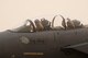Brig. Gen. Kyle Robinson, 332nd Air Expeditionary Wing commander, and Col. Shane Steinke, 332nd AEW vice commander, cheer in an F-15E Strike Eagle after flying Steinke’s final flight May 7, 2018, at an undisclosed location in Southwest Asia.