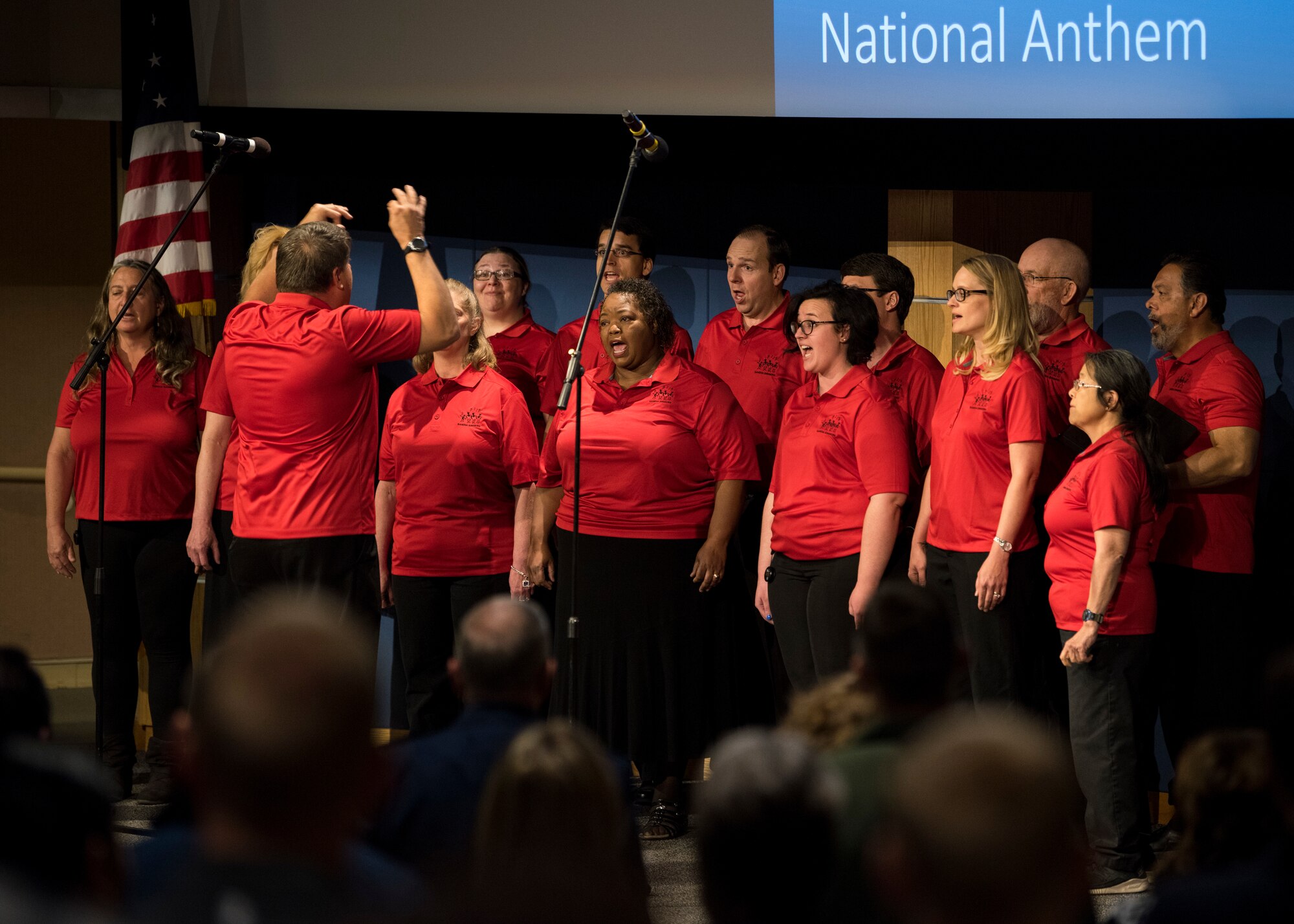 The Sandia Singers perform the National Anthem at the 67th Annual National Day of Prayer observance at Kirtland Air Force Base, N.M., May 3. The National Day of Prayer observance was created in 1952 by a joint resolution of the United States Congress, and signed into law by President Harry S. Truman.(U.S. Air Force photo by Staff Sgt. J.D. Strong II)