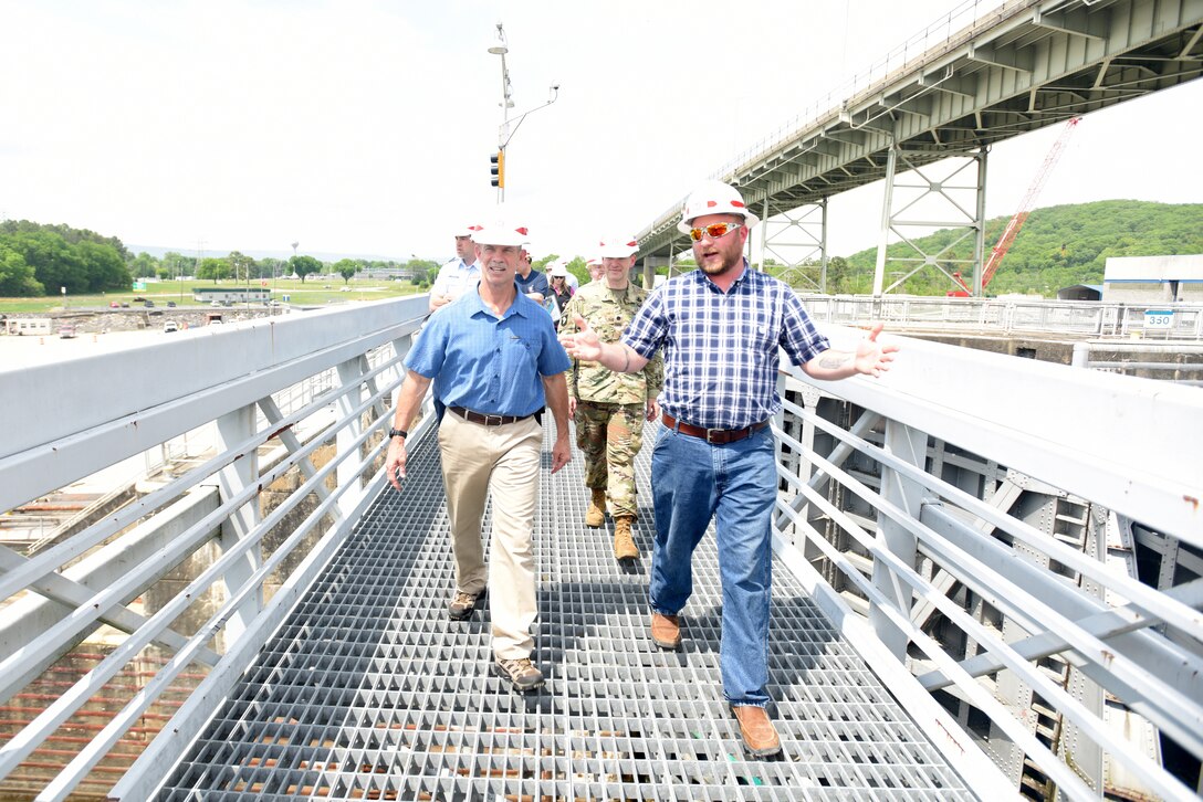 Cory Richardson (Right), lockmaster with the U.S. Army Corps of Engineers Nashville District, leads Vice Adm. Charles Ray, U.S. Coast Guard deputy commandant for Operations, on a tour of Chickamauga Lock May 4, 2018 at Tennessee River mile 471 in Chattanooga, Tenn. Ray is the incoming assistant commandant of the Coast Guard. (USACE Photo by Lee Roberts)