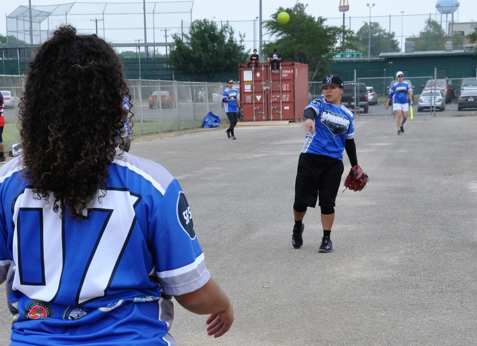 Tech. Sgt. Christina Rapolla, 433rd Training Squadron and JBSA-Lackland Warhawks women’s softball team member, warms up before a game. (U.S. Air Force photo by Debbie Gildea)