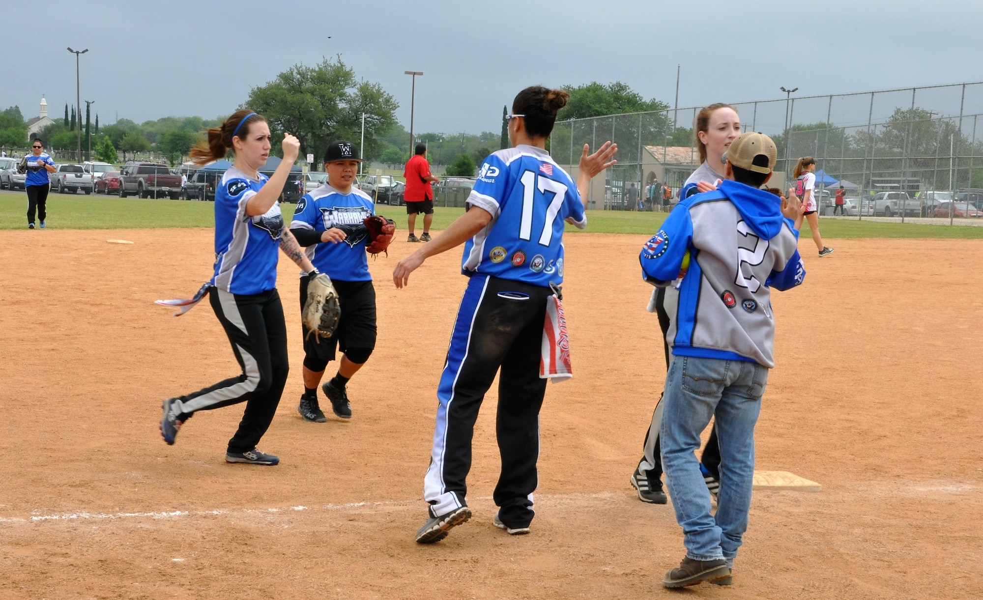 It’s three up, three down and the lady Warhawks are back up for their turn at bat. (U.S. Air Force photo by Debbie Gildea)