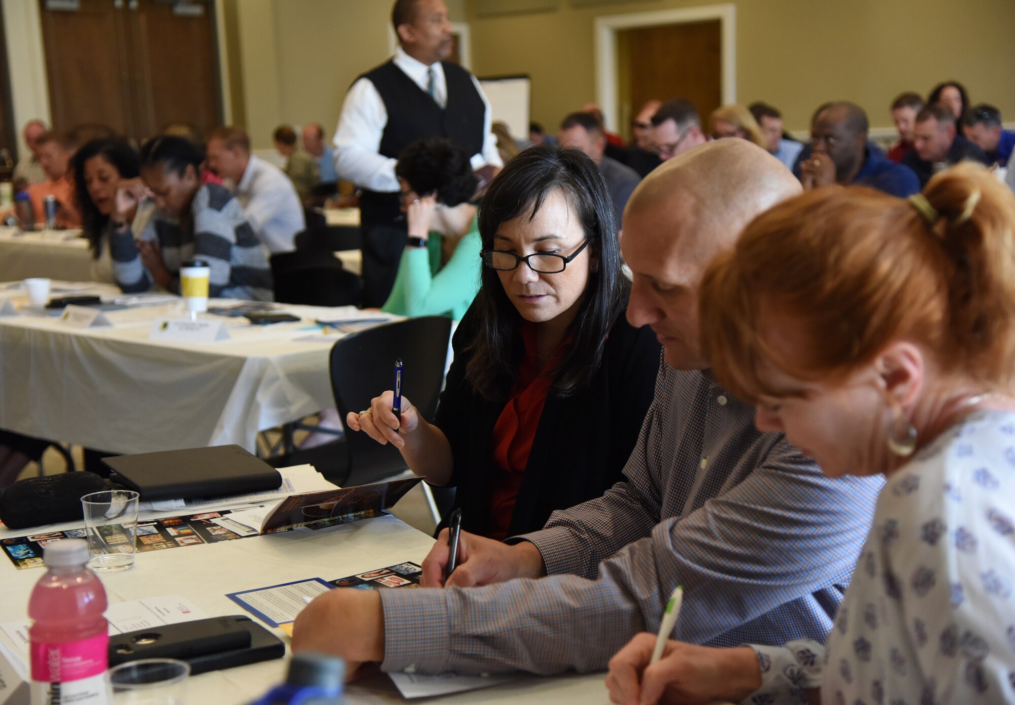 U.S. Air Force Col. Debra Lovette, 81st Training Wing commander, and Chief Master Sgt. Kenneth Carter, 81st TRW command chief, participate in a personality assessment project during the 81st TRW Spring 2018 Off-Site Commander’s Conference at The Salvation Army Kroc Center in Biloxi, Mississippi, May 2, 2018. Keesler leaders were provided with a “Mindfulness & Human Performance Culture” seminar and participated in small group discussions and presentations. (U.S. Air Force photo by Kemberly Groue)