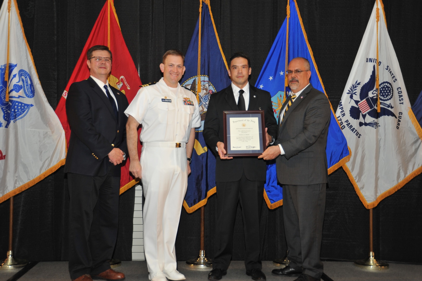IMAGE: Robert Ward is presented the Navy Meritorious Civilian Service Award at Naval Surface Warfare Center Dahlgren Division's annual awards ceremony, Apr. 26 at the Fredericksburg Expo and Conference Center.