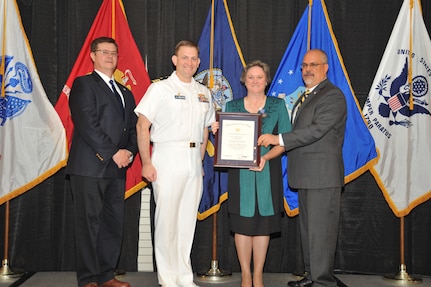 IMAGE: Jacqueline Cheramie is presented the Navy Meritorious Civilian Service Award at Naval Surface Warfare Center Dahlgren Division's annual awards ceremony, Apr. 26 at the Fredericksburg Expo and Conference Center.