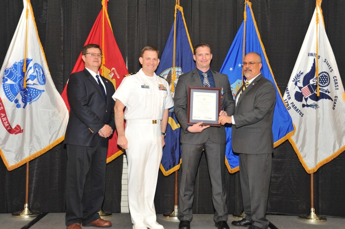 IMAGE: Jeff Allen is presented the Navy Meritorious Civilian Service Award at Naval Surface Warfare Center Dahlgren Division's annual awards ceremony, Apr. 26 at the Fredericksburg Expo and Conference Center