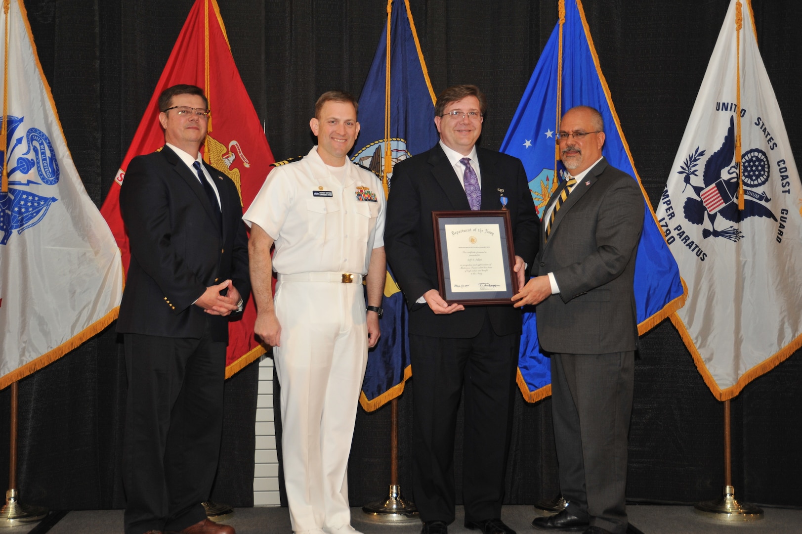 IMAGE: Jeff Allen is presented the Navy Meritorious Civilian Service Award at Naval Surface Warfare Center Dahlgren Division's annual awards ceremony, Apr. 26 at the Fredericksburg Expo and Conference Center
