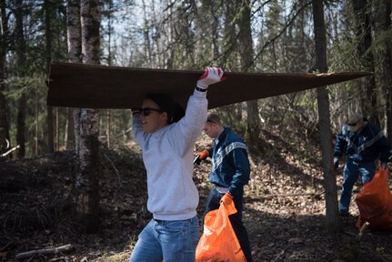 Airman Leadership School students help clean up Davis Park in Anchorage Alaska, May 5, 2018. This event emphasized the importance of keeping local areas clean and building relationships with the community.