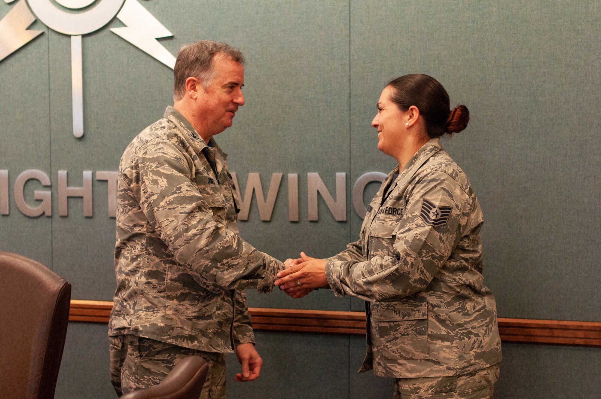 Col. Gregory Jones, 301st Fighter Wing commander, presents Tech. Sgt. Catherine Anderson, a vehicle operator assigned to the 301st Logistics Readiness Squadron, with the wing’s Non-Commissioned Officer of the Year before senior leadership May 6, 2018 at Naval Air Station Fort Worth Joint Reserve Base, Texas. The wing’s annual award winners are among the best of the best and standout examples of Reserve Citizen Airmen. (U.S. Air Force photo by Master Sgt. Joshua Woods)