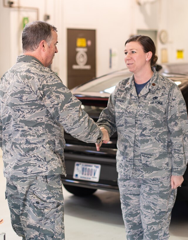 During a 301st Logistics Readiness Squadron visit, Col. Gregory Jones, 301st Fighter Wing commander, presents Maj. Rachael Lagerquist, 301st LRS commander, with the Field Grade Officer of the Year award at Naval Air Station Fort Worth Joint Reserve Base, Texas May 6, 2018. The wing’s annual award winners are among the best of the best and standout examples of Reserve Citizen Airmen. (U.S. Air Force photo by Master Sgt. Joshua Woods)