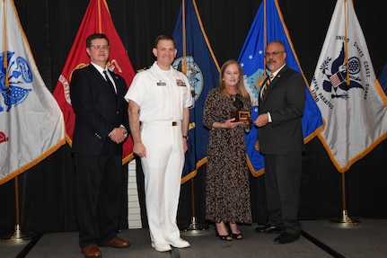 IMAGE: Denise Bagnall is presented the John Adolphus Dahlgren Award at Naval Surface Warfare Center Dahlgren Division's annual awards ceremony, Apr. 26 at the Fredericksburg Expo and Conference Center.

The Dahlgren Award is named for Rear Adm. John A. Dahlgren – who is considered the "Father of Modern Naval Ordnance" - and honors individuals with significant achievement in science, engineering or management.