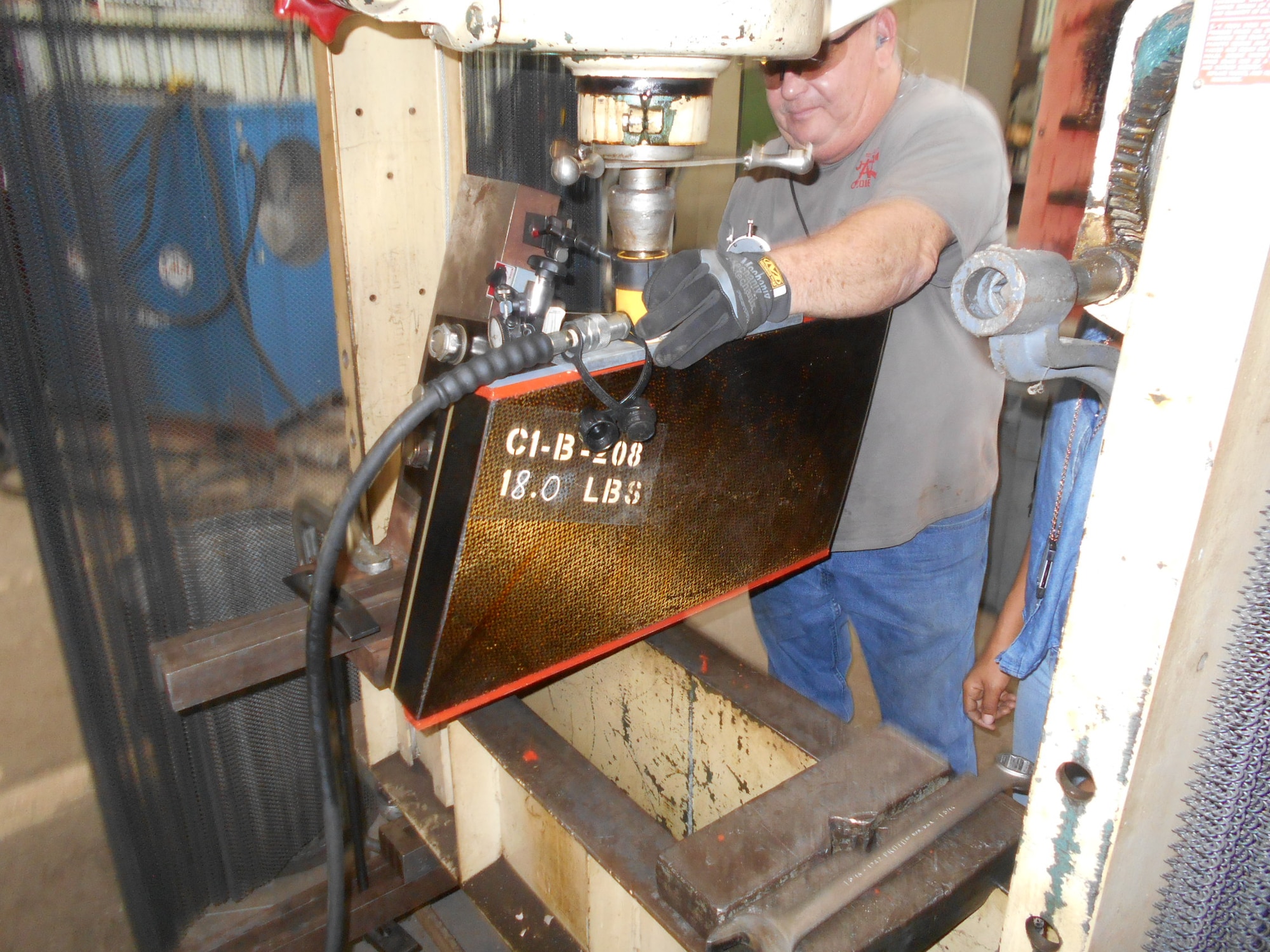 Machinist Rex Jones works on a compressor blade in the Arnold Air Force Base Model and Machine Shop. Machinists recently aided Propulsion Wind Tunnel 16T personnel in the completion of compressor blade spacer testing. (U.S. Air Force Photo)