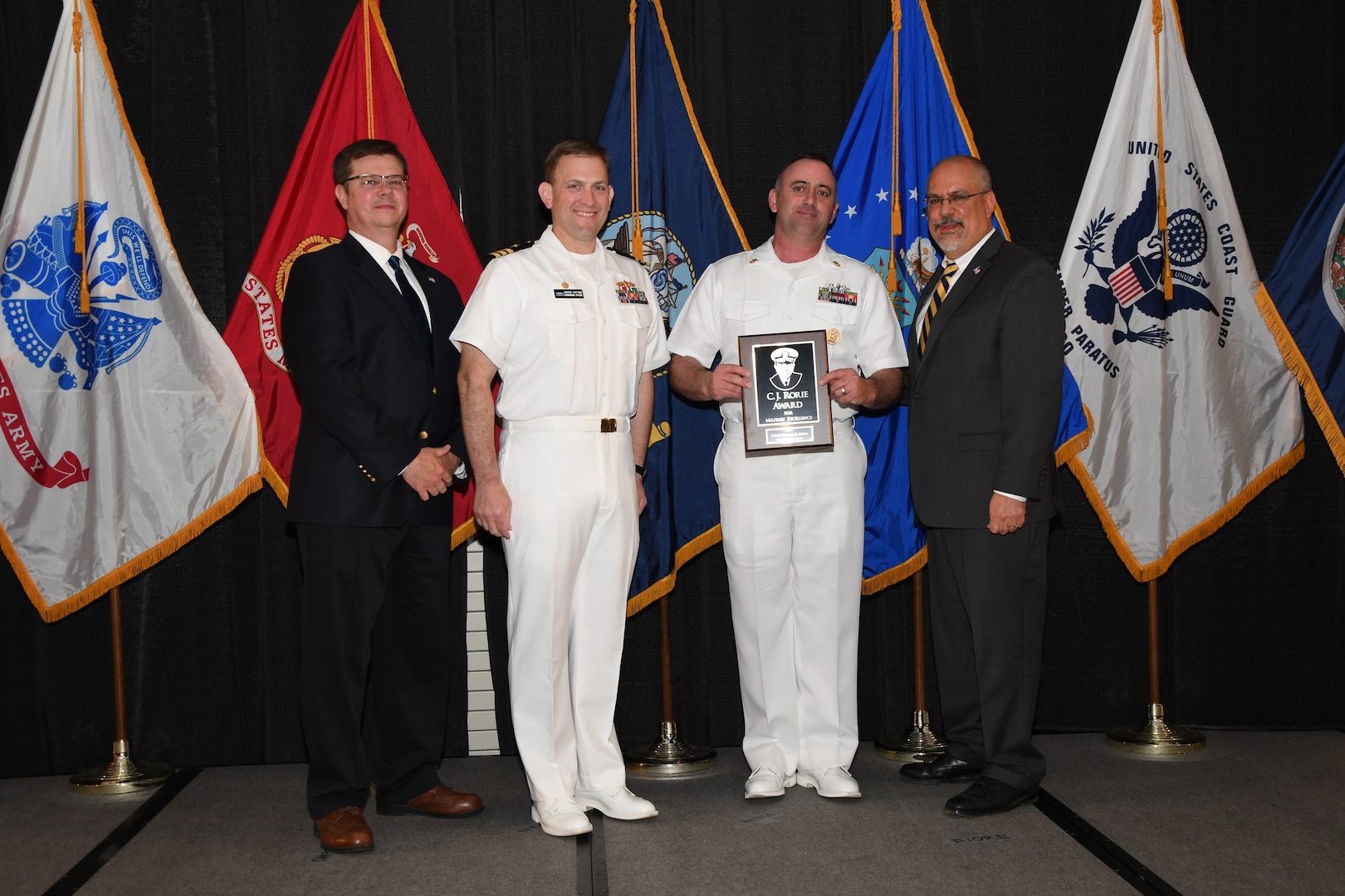 IMAGE: Master Chief Fire Controlman Nathaniel Melvin is presented the C.J. Rorie Award at Naval Surface Warfare Center Dahlgren Division's annual awards ceremony, Apr. 26 at the Fredericksburg Expo and Conference Center.

The C.J. Rorie Award was established to recognize military personnel assigned to NSWCDD whose excellence in the performance of their duties contributed significantly to the effectiveness of the Division's military operation.