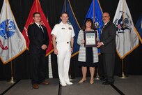 IMAGE: Cheryl Subacius is presented the Helen Springer Award at Naval Surface Warfare Center Dahlgren Division's annual awards ceremony, Apr. 26 at the Fredericksburg Expo and Conference Center.

The award recognizes individuals who have made a notable and significant impact to business operations at NSWCDD. The award was named in honor of Helen Springer, a former NSWCDD Deputy Human Resources Director who was instrumental in transforming business operations at Dahlgren from a paper-based system to an electronic environment.