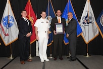 IMAGE: Michael Shively is presented the Helen Springer Award at Naval Surface Warfare Center Dahlgren Division's annual awards ceremony, Apr. 26 at the Fredericksburg Expo and Conference Center.

The award recognizes individuals who have made a notable and significant impact to business operations at NSWCDD. The award was named in honor of Helen Springer, a former NSWCDD Deputy Human Resources Director who was instrumental in transforming business operations at Dahlgren from a paper-based system to an electronic environment.