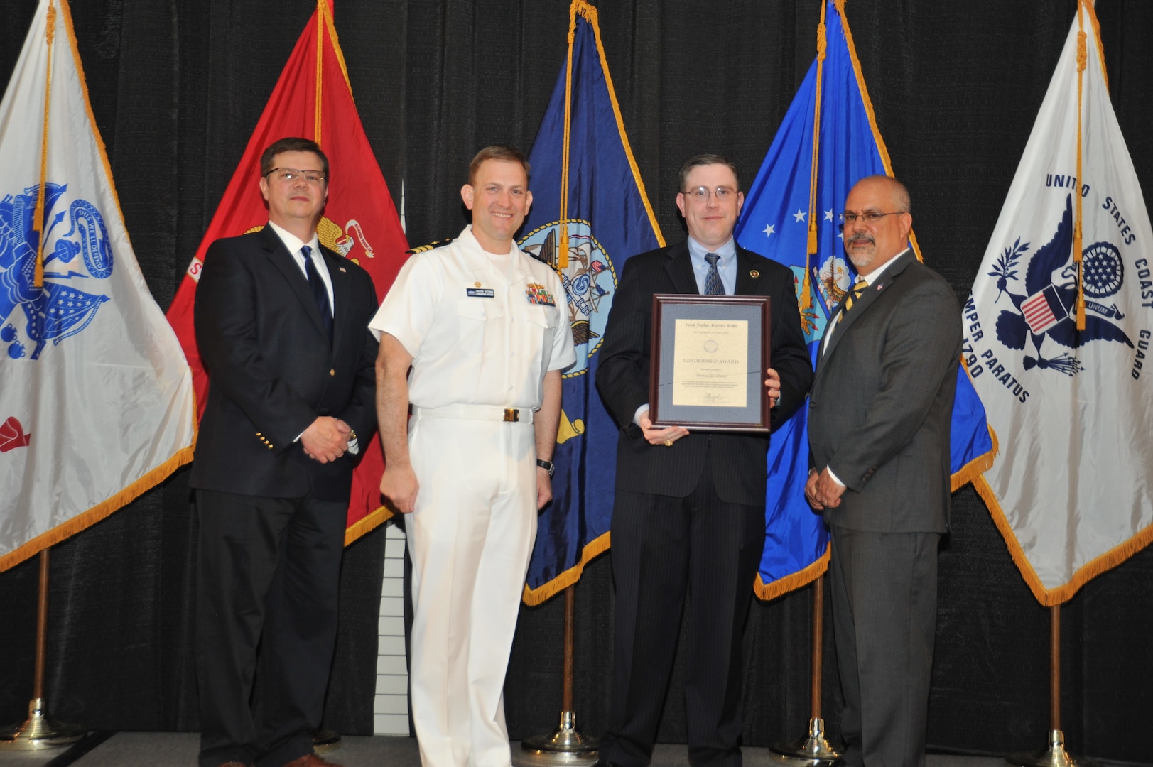 IMAGE: Daniel Dunn is presented the Leadership Award at Naval Surface Warfare Center Dahlgren Division's annual awards ceremony, Apr. 26 at the Fredericksburg Expo and Conference Center.