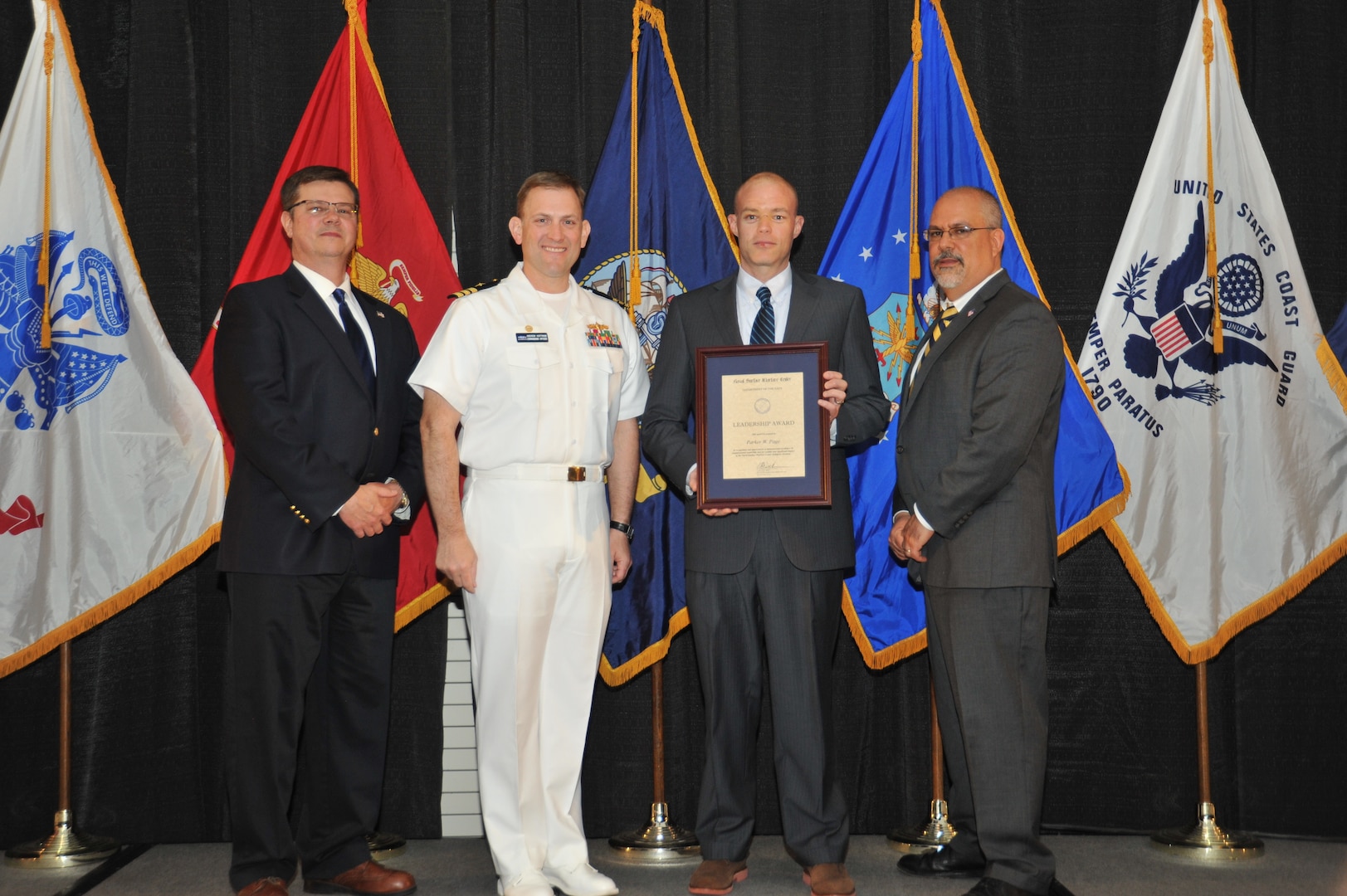 IMAGE: Parker Page is presented the Leadership Award at Naval Surface Warfare Center Dahlgren Division's annual awards ceremony, Apr. 26 at the Fredericksburg Expo and Conference Center.