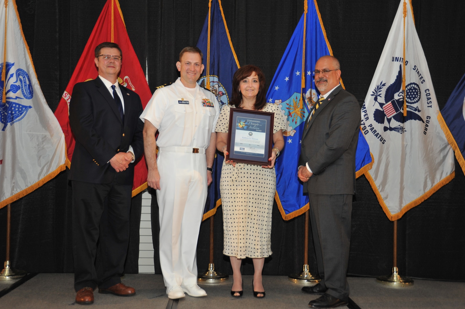IMAGE: Kathryn Dawson is presented the Commander's Diversity and Inclusion Award at Naval Surface Warfare Center Dahlgren Division's annual awards ceremony, Apr. 26 at the Fredericksburg Expo and Conference Center.