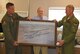 Jerry Hester, World War I centennial commissioner, presented the 50th Attack Squadron with a painting at Shaw Air Force Base, S.C., May 2, 2018.