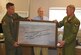 Jerry Hester, World War I centennial commissioner, presented the 50th Attack Squadron with a painting at Shaw Air Force Base, S.C., May 2, 2018.