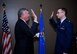 United States Army retired Brig. Gen.Charles Kruse, performs the oath of enlistment again for newly pinned Chaplain (Maj.) Michael Williams on May 6, 2018, at Scott Air Force Base, Ill.  Friends and family came to witness the special promotion ceremony and wish him well.  (U.S. Air Force photo by Lt. Col. Stan Paregien)