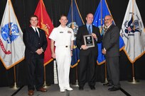 IMAGE: Christian Wahlquist is presented the Dr. Charles J. Cohen Award at Naval Surface Warfare Center Dahlgren Division's annual awards ceremony, Apr. 26 at the Fredericksburg Expo and Conference Center.

The award recognizes those who fundamentally impact science or technology with work that also measurably impacts capability.