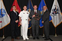 IMAGE: Martin Capone is presented the NSWCDD Award of Excellence for Analysis at Naval Surface Warfare Center Dahlgren Division's annual awards ceremony, Apr. 26 at the Fredericksburg Expo and Conference Center.

The NSWCDD Award of Excellence for Analysis is newly established to recognize individuals who have made a notable and significant impact to NSWCDD through their outstanding performance in analysis - warfare, design, engineering, modeling and simulation.