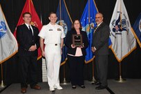 IMAGE: Nancy Taylor is presented the NSWCDD Award of Excellence for Analysis at Naval Surface Warfare Center Dahlgren Division's annual awards ceremony, Apr. 26 at the Fredericksburg Expo and Conference Center.

The NSWCDD Award of Excellence for Analysis is newly established to recognize individuals who have made a notable and significant impact to NSWCDD through their outstanding performance in analysis - warfare, design, engineering, modeling and simulation.