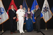 IMAGE: Carolyn Blakelock is presented the NSWCDD Award of Excellence for Analysis at Naval Surface Warfare Center Dahlgren Division's annual awards ceremony, Apr. 26 at the Fredericksburg Expo and Conference Center.

The NSWCDD Award of Excellence for Analysis is newly established to recognize individuals who have made a notable and significant impact to NSWCDD through their outstanding performance in analysis - warfare, design, engineering, modeling and simulation.