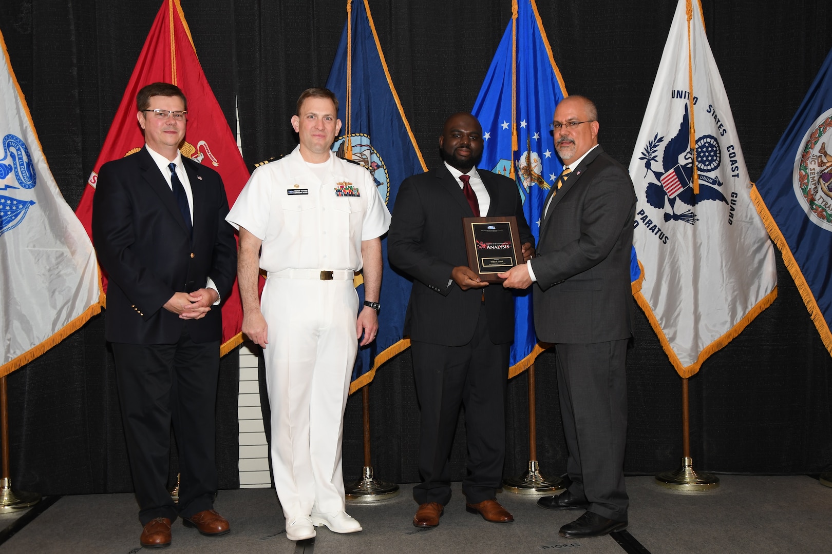 IMAGE: Willie Crank is presented the Commander's Diversity and Inclusion Award at Naval Surface Warfare Center Dahlgren Division's annual awards ceremony, Apr. 26 at the Fredericksburg Expo and Conference Center.

The NSWCDD Award of Excellence for Analysis is newly established to recognize individuals who have made a notable and significant impact to NSWCDD through their outstanding performance in analysis - warfare, design, engineering, modeling and simulation.