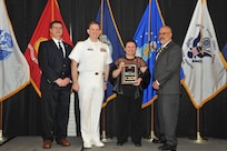 IMAGE: Carol Lee is presented the  NSWCDD Award of Excellence for Software Engineering and Integration at Naval Surface Warfare Center Dahlgren Division's annual awards ceremony, Apr. 26 at the Fredericksburg Expo and Conference Center.

The NSWCDD Award of Excellence for Software Engineering and Integration was established to recognize individuals who have made a notable and significant impact to NSWCDD through their outstanding performance in Software Engineering & Integration.