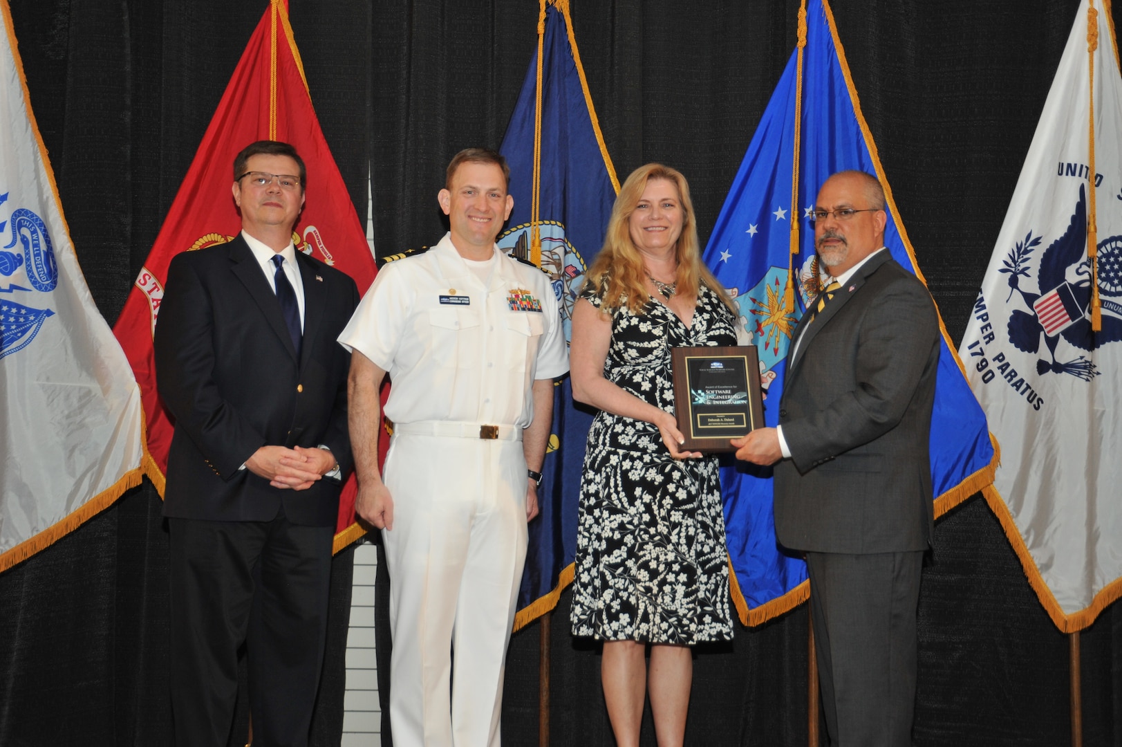 IMAGE: Deborah Daland is presented the  NSWCDD Award of Excellence for Software Engineering and Integration at Naval Surface Warfare Center Dahlgren Division's annual awards ceremony, Apr. 26 at the Fredericksburg Expo and Conference Center.

The NSWCDD Award of Excellence for Software Engineering and Integration was established to recognize individuals who have made a notable and significant impact to NSWCDD through their outstanding performance in Software Engineering & Integration.